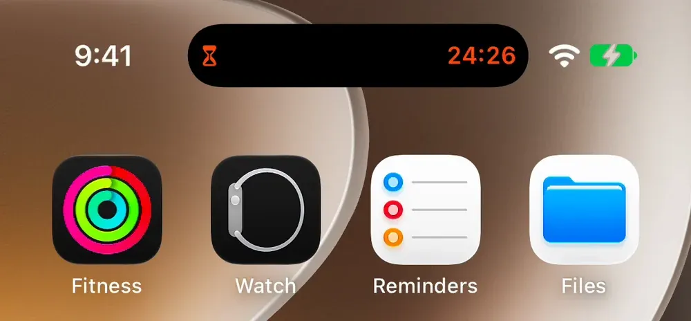 The Dynamic Island during a focus: an orange hourglass on the left, 24:26 on the right