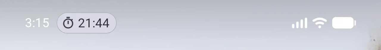 Android 16 status bar during a focus: the clock, then a chip with a stopwatch icon and 21:44